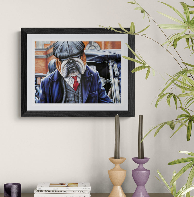 Framed artwork of a bulldog in a suit and hat on a wall with decorative elements.