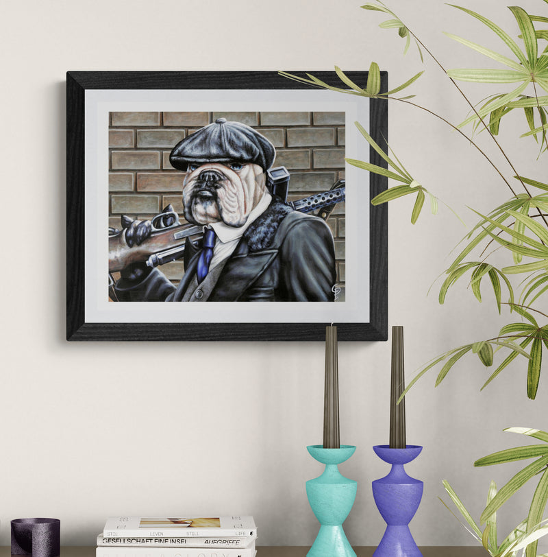 Framed artwork of a dog in a suit and hat on a wall with decorative vases and plants.