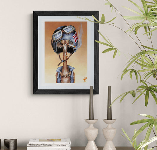 Framed artwork of a cat  wearing a helmet on a wall with decorative elements.