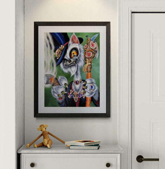 Framed artwork of a colorful cat creature with a staff on a white wall.