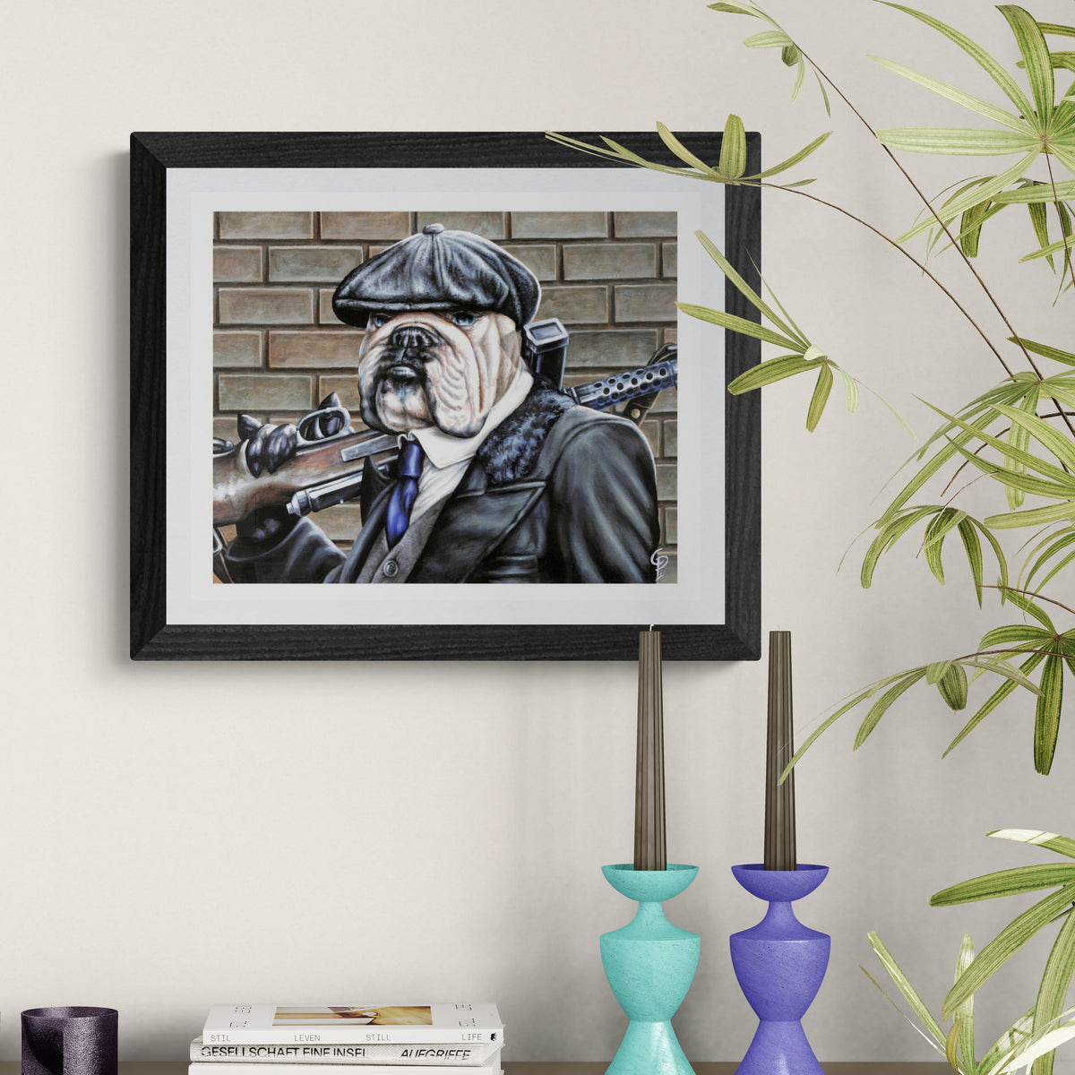 Framed artwork of a dog in a suit and hat on a wall with decorative vases and plants.