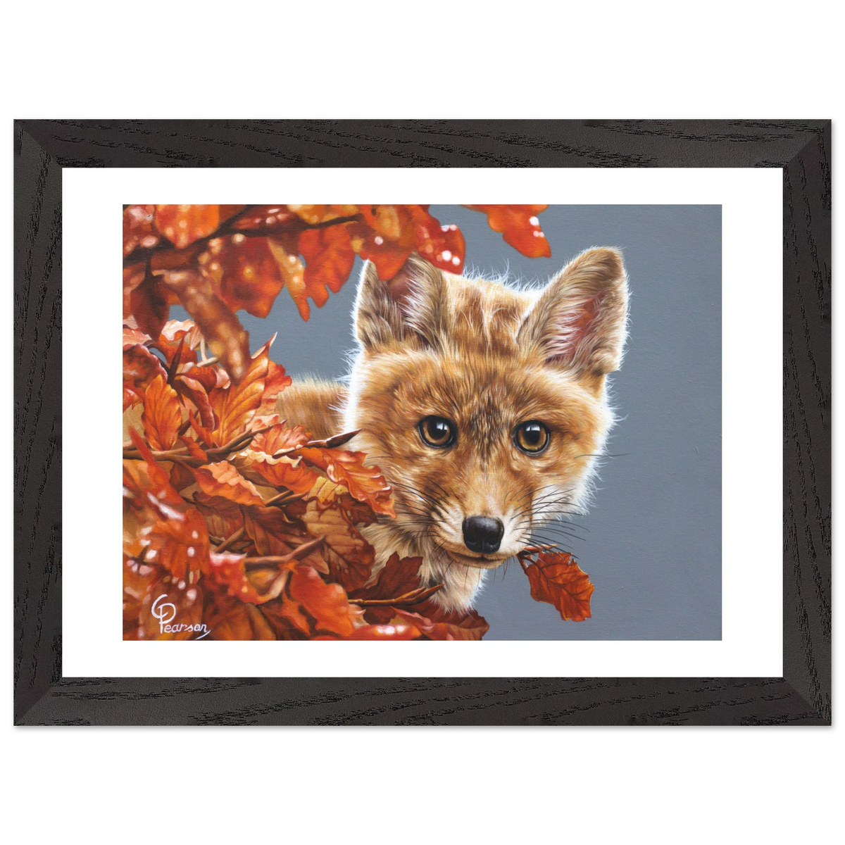 Framed artwork of a fox surrounded by autumn leaves