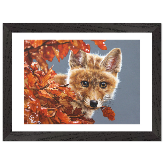 Framed artwork of a fox surrounded by autumn leaves