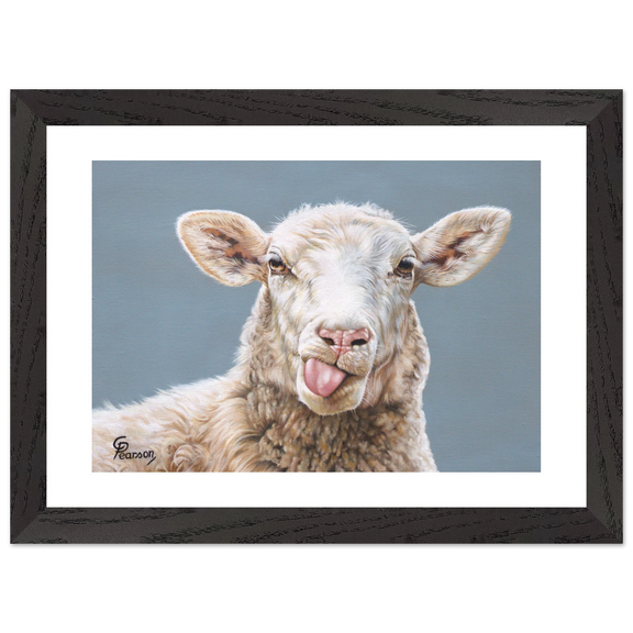 Framed artwork of a sheep sticking its tongue out on a gray background