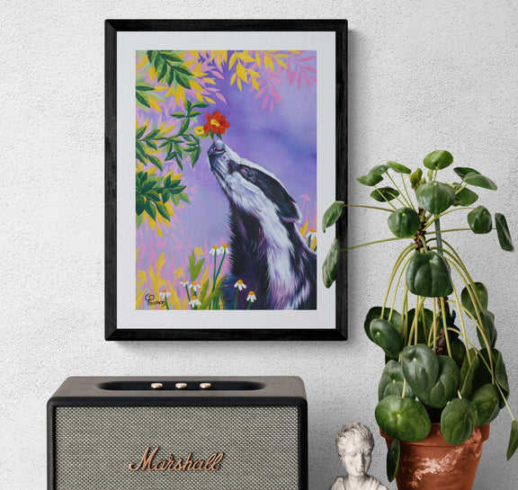 badger sniffing flower