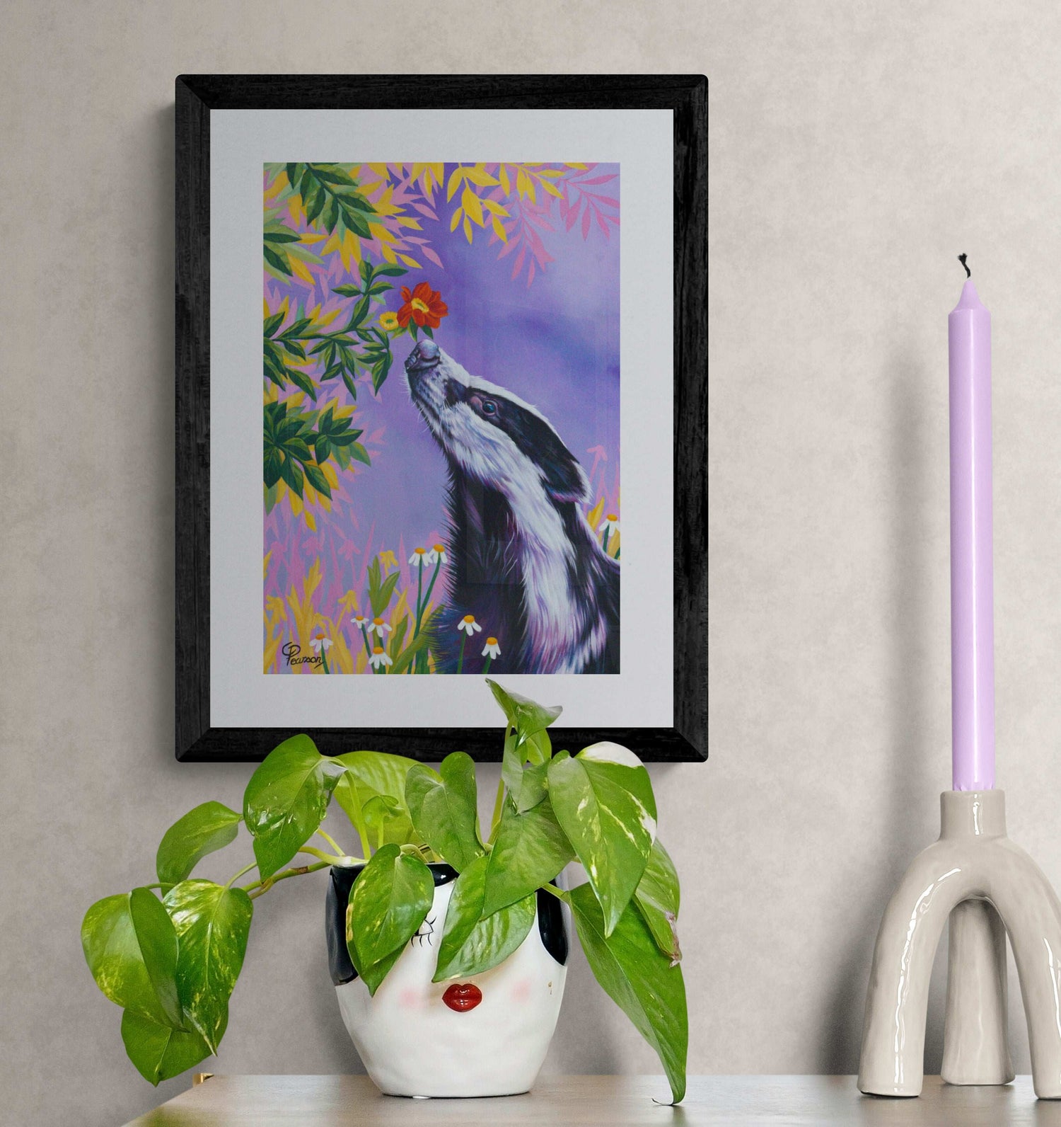 badger sniffing flower