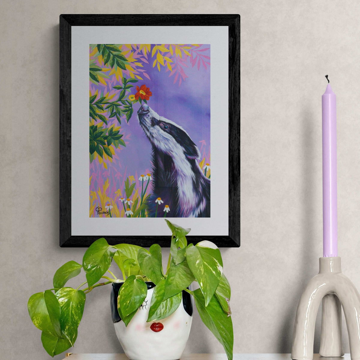 badger sniffing flower