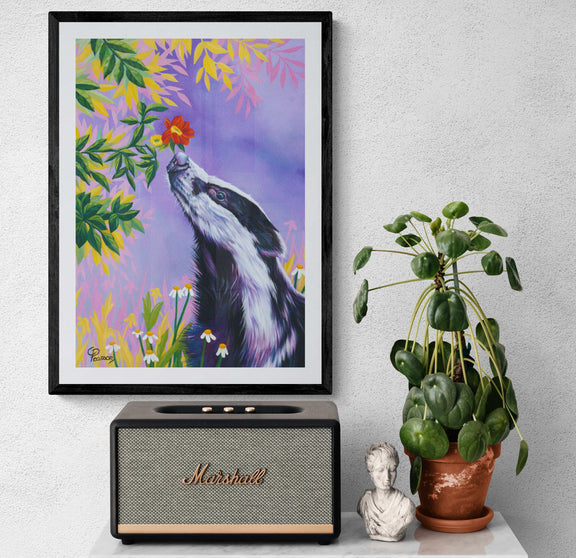 badger sniffing flower 